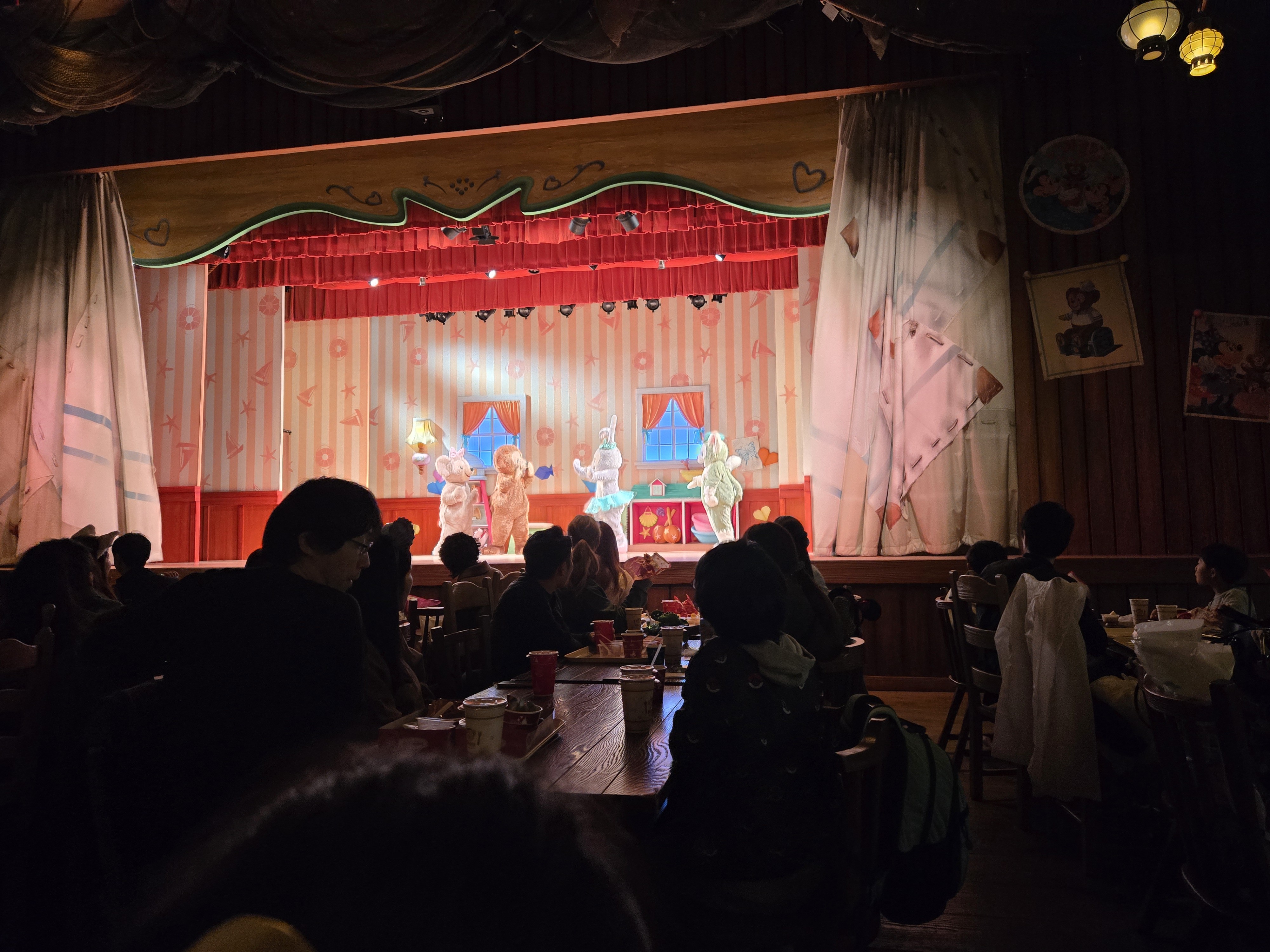 A Duffy-and-friends-themed stage show performing for diners at Cape Cod Cook-Off in Tokyo DisneySea.