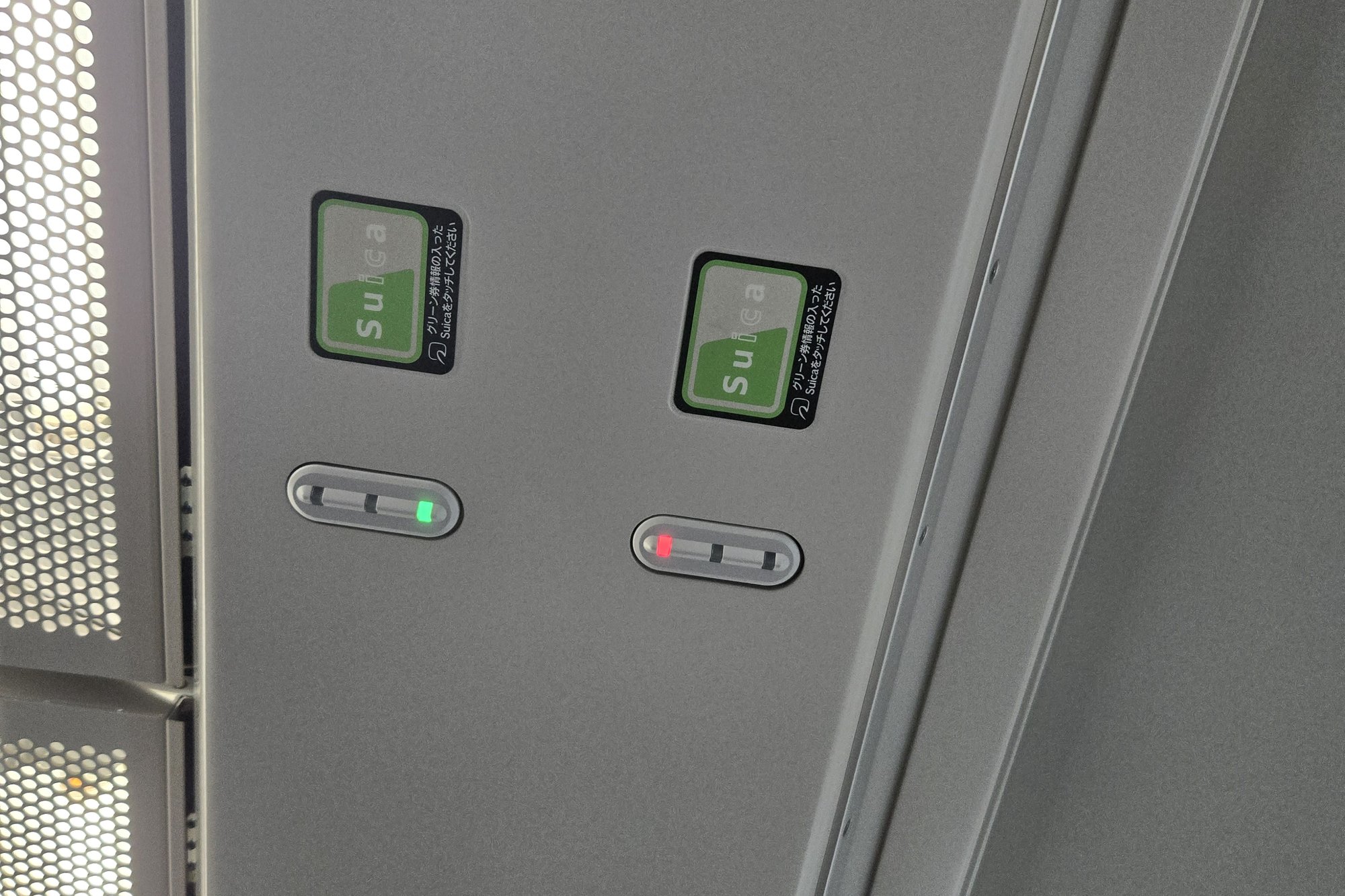 Two Green Car seat touch panels, one lit green and one lit red, showing seat occupancy status.
